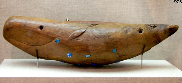 Inuit wood box for harpoon points in shape of whale (1860-80) from Alaska at de Young Museum. San Francisco, CA.