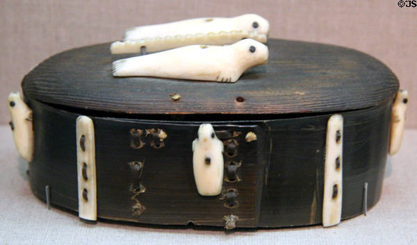 Inuit lidded container with carved seals (c1880) from Alaska at de Young Museum. San Francisco, CA.