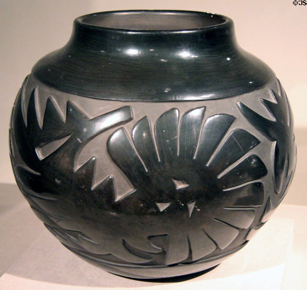 Santa Clara Pueblo earthenware black-on-black storage jar (olla) (late 20thC) by Camilio Tafoya of New Mexico at de Young Museum. San Francisco, CA.