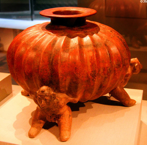 Colima earthenware squash vessel supported by men (300 BCE-300 CE) from West Mexico at de Young Museum. San Francisco, CA.