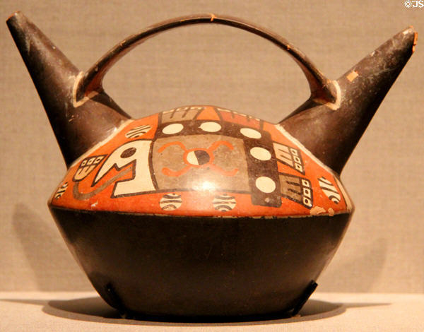 Pachacamac earthenware double-spout & bridge vessel (550-900) from Peru at de Young Museum. San Francisco, CA.