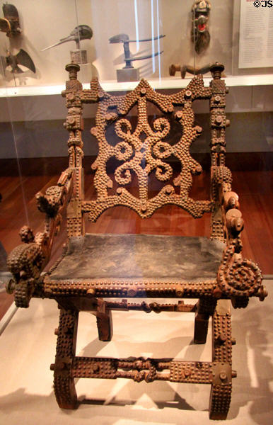Carved royal chair from Ghana at de Young Museum. San Francisco, CA.