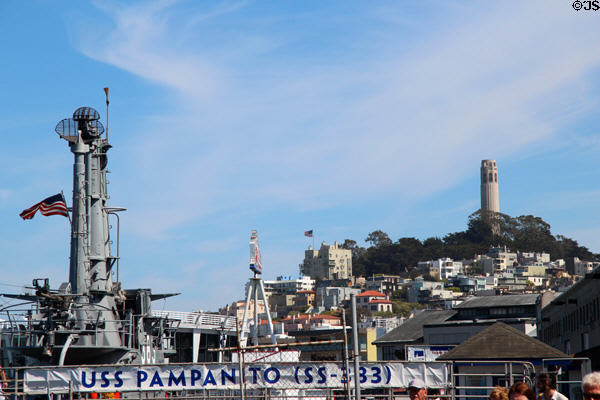 Conning tower of Submarine USS Pampanito seen against Coit Tower. San Francisco, CA.