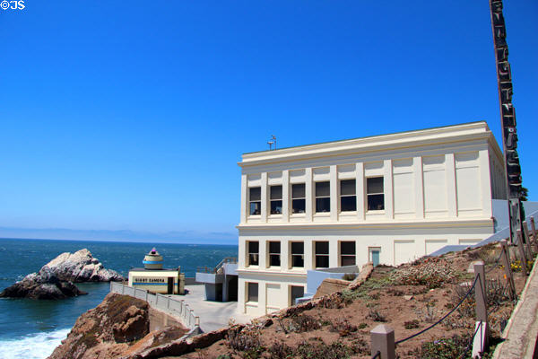 Cliff House with totem pole & Giant Camera over Pacific Ocean. San Francisco, CA.
