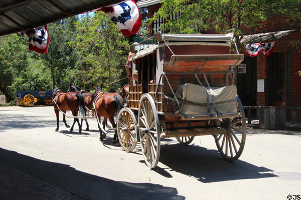 Stage coach & horses used to transport visitors around Columbia State Historic Park. Columbia, CA.
