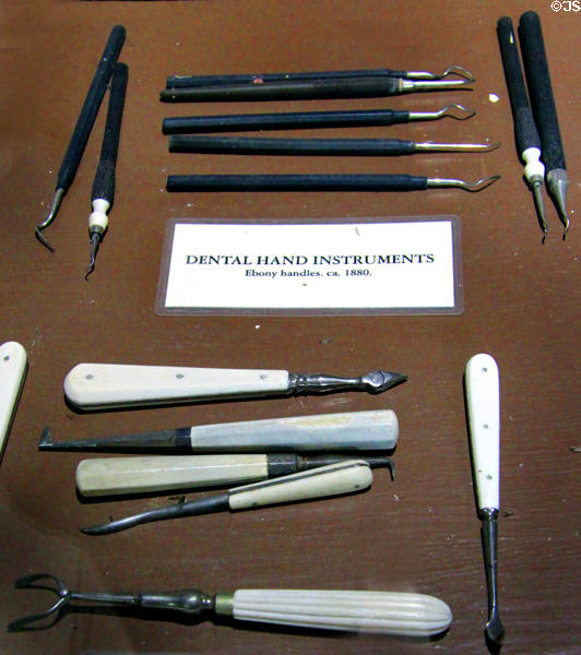 Dental hand instruments with ebony (c1880) & ivory (c1860) handles displayed in dentist's office at Columbia State Historic Park. Columbia, CA.