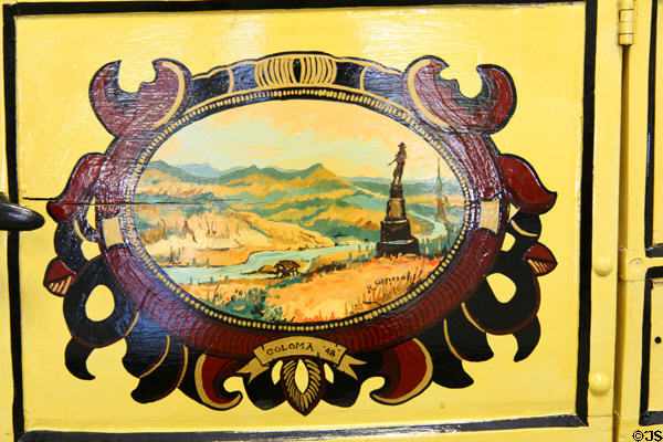 Cartouche on door of Downing & Sons Concord coach at Angels Camp Museum. Angels Camp, CA.