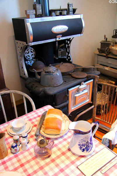 Old time kitchen with pitcher made especially for the store of Rosa A. Agostini & Stewart cast-iron range at Calaveras County Downtown Museum. San Andreas, CA.