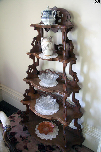 Display shelf with ceramics & glass at Bidwell Mansion house museum. Chico, CA.
