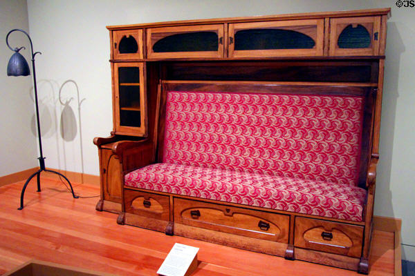 Arts & Crafts cabinet settle (1898-1902) by Frederick H. Meyer at Oakland Museum of California. Oakland, CA.