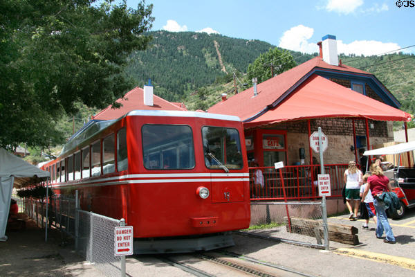 Modern Swiss-made passenger cars of Pike's Peak Cog Railway sit beside depot. Manitou Springs, CO.