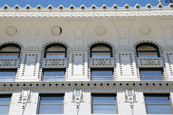 Upper story details of Gas & Electric Building with style made popular by Louis Sullivan. Denver, CO.