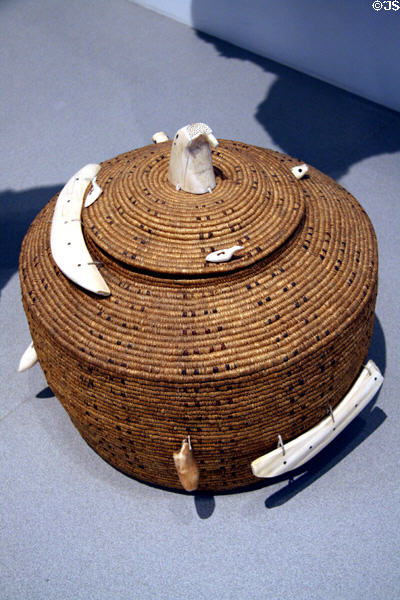 Inupiaq woven basket with lid & animal ivory figures (c1900) from Pt. Barrow, AK at Denver Art Museum. Denver, CO.