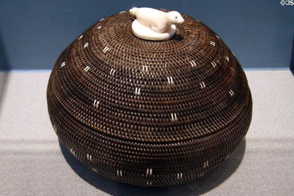 Inupiaq woven basket with lid & ivory seal handle (1950) by Abe Simmons at Denver Art Museum. Denver, CO.