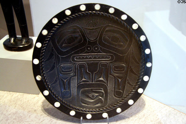 Haida argillite carved plate with ivory disks (c1880) at Denver Art Museum. Denver, CO.