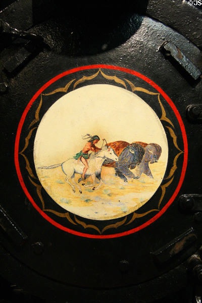 Painting of Indian chasing buffalo on nose of German locomotive nr 7 at Forney Museum. Denver, CO.
