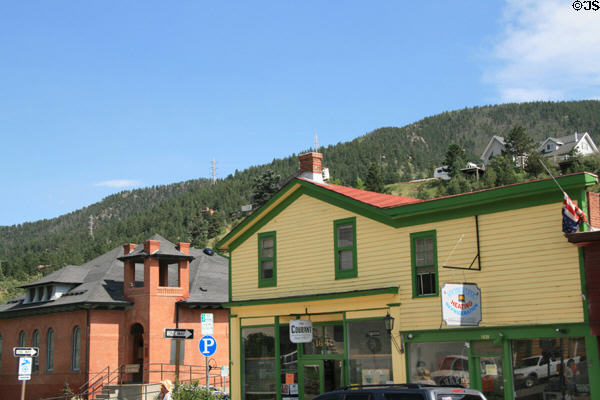 City Hall & Windsor Building (1873) (1639-41 Miner St.)against mountain backdrop. Idaho Springs, CO.