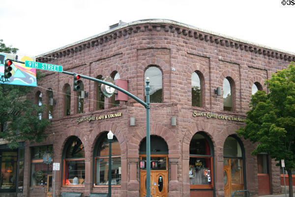 Red stone commercial building (900 Main Ave.). Durango, CO. Style: Romanesque Revival.