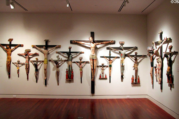 Collection of Santos art crucifixes (1820-1910) by various Hispanic artists at Colorado Springs Fine Arts Center. Colorado Springs, CO.