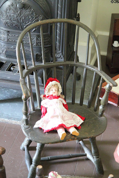 Doll & chair at McAllister House Museum. Colorado Springs, CO.