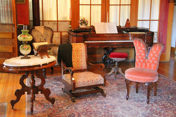 Square grand piano (prior to 1875) by W.P. Emerson of Boston plus table & chairs at Miramont Castle. Manitou Springs, CO.