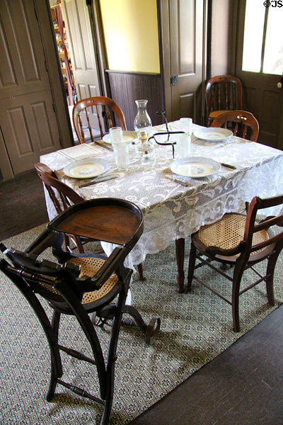 Dining room with high chair in Chambers Home at Rock Ledge Ranch Historic Site. Colorado Springs, CO.