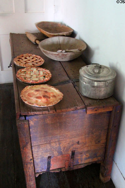 Wooden storage chest with wooden bowls & crock at Baca Adobe House. Trinidad, CO.