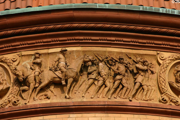 Frieze on P.T. Barnum building showing Civil War troops marching. Bridgeport, CT.