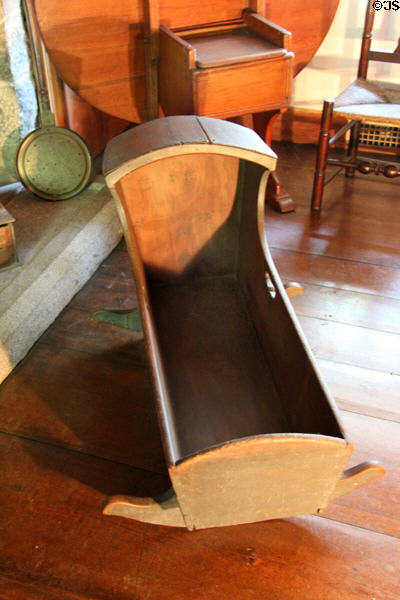 Pine hooded cradle (early 19thC) at Henry Whitfield State Museum. Guilford, CT.