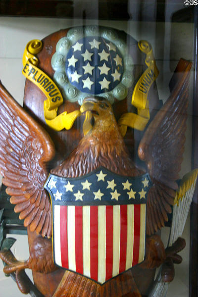 Eagle figurehead of USS Connecticut carved so eagle faces olive branch rather than arrows, symbolic of peace mission in Connecticut State Capitol. Hartford, CT.