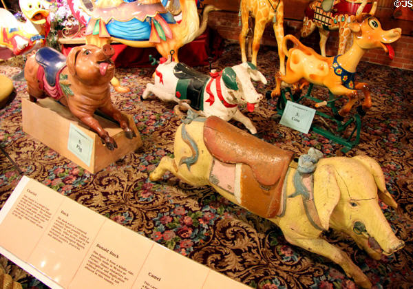 Carved pigs & cows from several carousels at New England Carousel Museum. Bristol, CT.