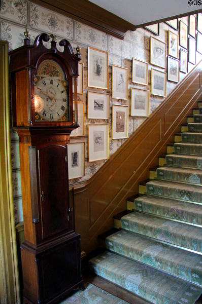 Entry hall staircase with tall clock (c1820) by Robert MacAdam of Dumfries, Scotland at Hill-Stead Museum. Farmington, CT.