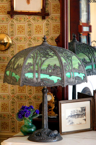Cast iron lamp with green glass at Butler-McCook House Museum. Hartford, CT.