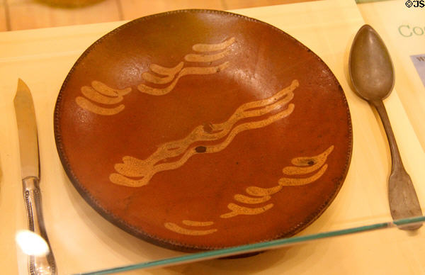 Redware plate (1830-50) possibly by Smith Pottery, Norwalk, CT at Connecticut Historical Society. Hartford, CT.