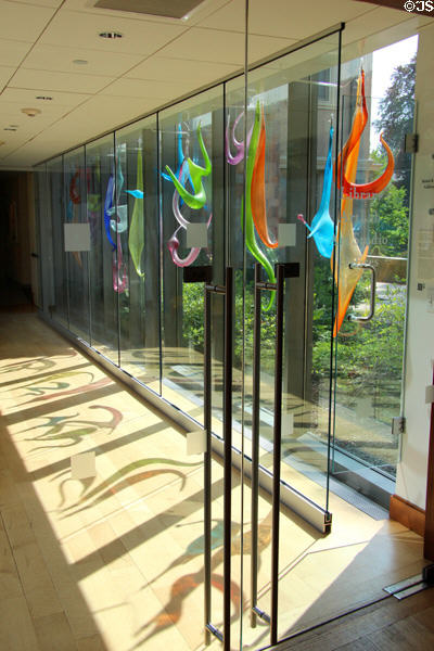 Glass corridor between buildings New Britain Museum of American Art with colored glass sculptures. New Britain, CT.