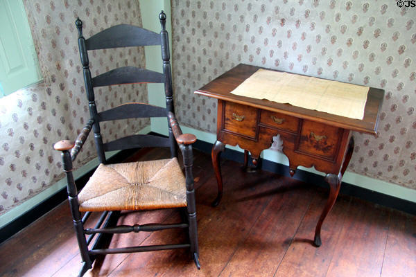 Ladder-back rocking chair & table with drawers which belonged to Oliver's mother at Oliver Ellsworth Homestead Museum. Windsor, CT.