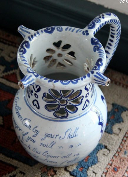 Blue decorated puzzle jug with English rhyme at Phelps-Hathaway House. Suffield, CT.