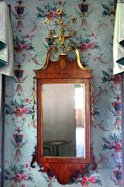 Early American mirror with flowered finial at Phelps-Hathaway House. Suffield, CT.