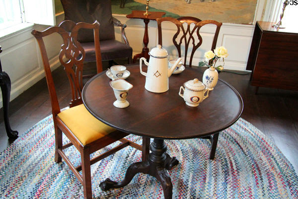 Round table with chairs & porcelain objects at Joseph Webb House. Wethersfield, CT.