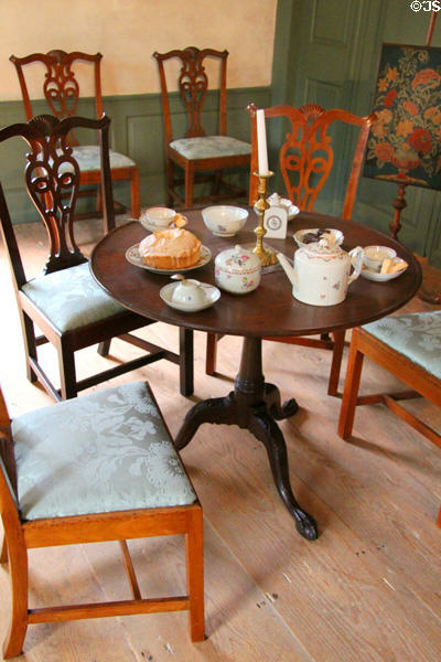 Round tea table with chairs & tea service at Silas Deane House. Wethersfield, CT.