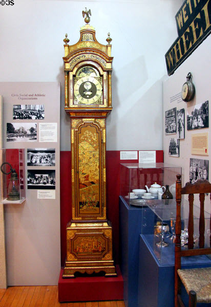 Gallery with gilded tall case clock (c1730) at Wethersfield Museum. Wethersfield, CT.
