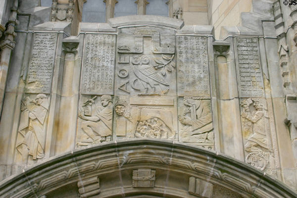 History of writing relief showing Arabic, ancient Greek, Chinese & Mayan glyphs carved above portal of Sterling Memorial Library. New Haven, CT.