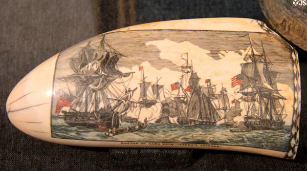 Scrimshaw (c1850) whale's tooth scene of Battle of Lake Erie - Perry's Victory at Mystic Seaport art museum. Mystic, CT.