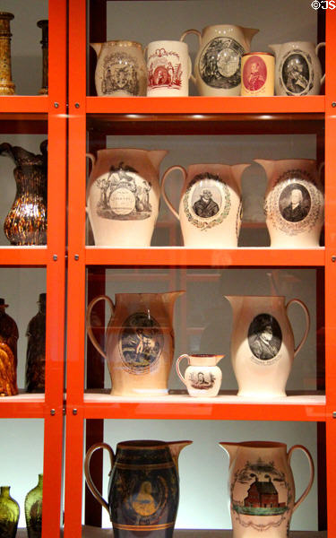 Collection of commemorative creamware pitchers (c1800-20) mostly from Liverpool, England at Mattatuck Museum. Waterbury, CT.