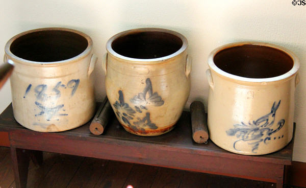 Stoneware crocks with cobalt blue painted designs (one from 1859) at Judson House. Stratford, CT.