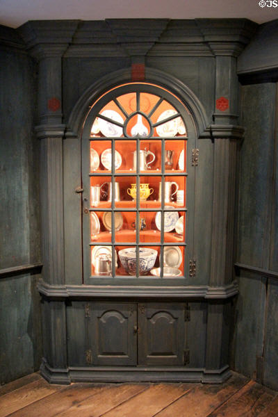 Corner cupboard (c1768) with collection of ceramics & pewter at Yale University Art Gallery. New Haven, CT.