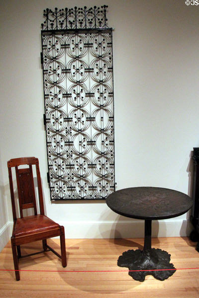 Ironwork grill from Chicago Stock Exchange (c1893) by Dankmar Adler and Louis Sullivan; side chair from Blacker House in Pasadena, CA (1907) by Greene & Greene; & Lotus Table from Gables of Lake Minnetonka (c1905) by John Scott Bradstreet at Yale University Art Gallery. New Haven, CT.