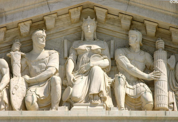 Justice holding scales with Medieval & Roman soldiers Supreme Court. Washington, DC.