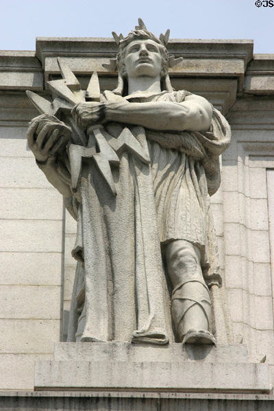 Sculpture of man holding bolts of electricity on Union Station. Washington, DC.