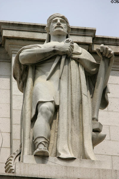 Sculpture of man holding tools of industry on Union Station. Washington, DC.